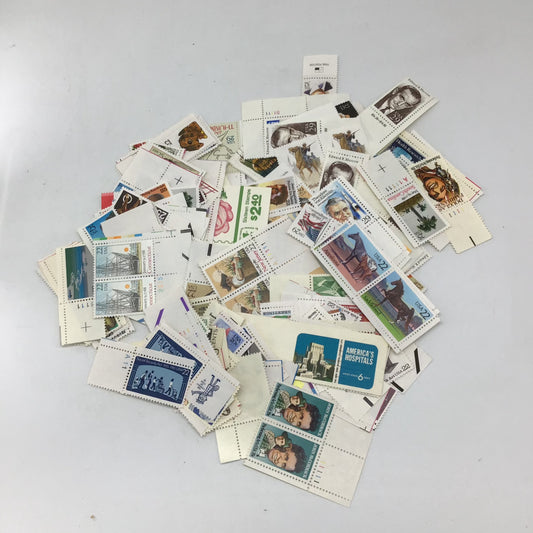 Assortment of 64 sheets of Vintage Mint Stamps