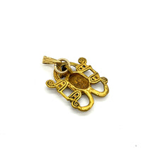 Load image into Gallery viewer, Gold Tone Tribal Turtle Pendant
