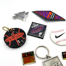 Load image into Gallery viewer, Set of Nike Memorabilia (pins, keychains, patch)
