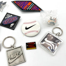 Load image into Gallery viewer, Set of Nike Memorabilia (pins, keychains, patch)
